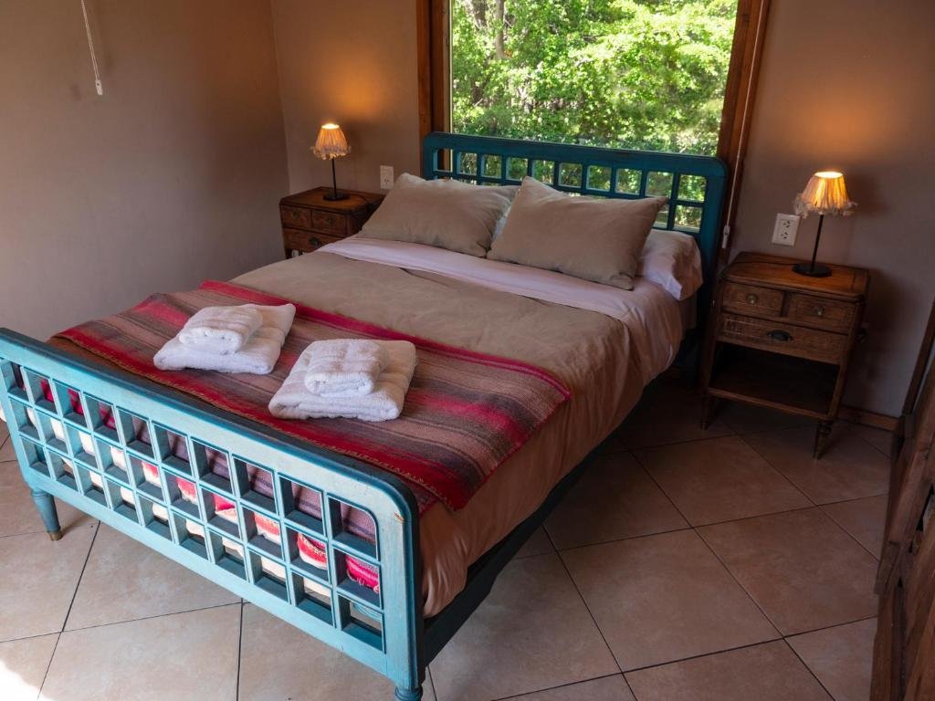 Habitación matrimonial de una cabaña